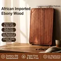 3cm thick ebony wood cutting board with metal handle and juice groove detail - T-Handle Grooved Board 45*30*3cm