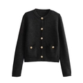 Detailed view of luxury gold embossed buttons on a classic black knit cardigan - Black