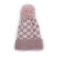 Detailed view of pink and white checkered knit beanie with a fluffy faux fur pom-pom - Pink & White Checkerboard / Pink