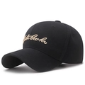Classic black washed cotton baseball cap with gold script embroidery and curved brim - Adjustable / Black