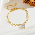 Pulsera de cadena de clip en acero dorado con un colgante de corazón de circón púrpura - Pulsera / Dorado (Zircón de Corazón Púrpura)