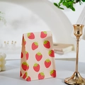 Mini gift paper bag with red strawberry pattern and cream yellow background for party favors - Strawberry