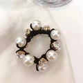 Close-up of elegant hair tie with alternating white pearls and sparkling rhinestones - 10 Pearls / Black