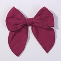 Deep red linen hair bow clip for girls featuring a classic double-layered textured design - Burgundy