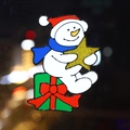 Christmas snowman window sticker with blue scarf and gold star on green gift box - Christmas Snowman with Gift and Star