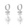 Detailed view of silver bow earrings with zircon stones and irregular rice pearls - Silver