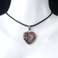 Pink marbled natural agate heart pendant necklace on a sleek black cord strap - Rhodonite