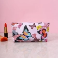 Pink makeup bag with colorful butterfly pattern and zip closure on marble tabletop - Pink Butterfly