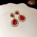Elegant vintage gold earrings featuring large red teardrop gemstones and cubic zirconia - 925 Silver Needle Style (47#)