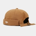 Close-up of the detailed white fox embroidery and canvas texture on the camel miki hat - Adjustable / Caramel color