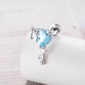 Silver bow heart zircon key earring stud on white minimalist jewelry display stand - Blue Heart Key (Single Piece)