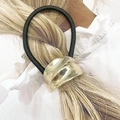 Sleek ponytail hair tie featuring a wavy gold metallic arc buckle on black elastic band - 4# Wave Curved Surface Style