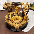 Carillon a forma di telefono retrò in oro e legno scuro con incisioni di rose eleganti - Nero