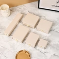 Beige drawer jewelry boxes in various sizes on marble surface with luxury decor - Pearly Off-white; 12*8*3cm