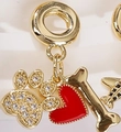Golden pet charm with red enamel heart, paw print, and bone for DIY jewelry - Pet Paw Bone