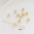 Détail de perles d'espacement creuses en laiton doré 6mm et clou à tête pour bijoux - 6mm / Or 14K