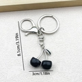Silver keychain with black cherry pendant featuring horseshoe clasp and ring 8.1cm - Glossy Black Cherry