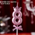 Metallic pink number 8 birthday candle with gold crown and glittery bow detail - Number Candle Pink With Crown And Bow (8)