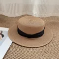 Flat top straw boater hat in light brown with wide black ribbon bow decoration - M / Khaki with Black Bow