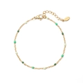 Bohemian gold stainless steel bracelet with gradient green enamel beads on white background - Gold Spring Colors