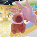 Plush Capybara keychain in brown with soft pink hood and golden metal clasp charm - Pig Hat Dark Brown + Gold Clip