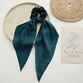 Dark green satin silk hair scrunchie with long ribbons on a decorative stone tray - Dark Green