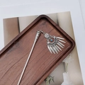 Detail of silver ethnic hair stick with blue beads and leaf tassels on wooden tray - F0742 Hair Stick-23# (Blue Bead Leaf Tassel)