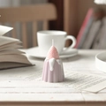 Detailed strawberry canele scented candle with wax drip on a cozy wooden table setup - Strawberry Pudding - Pink Purple