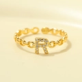 Adjustable S925 silver ring featuring a gold-plated letter R design with sparkling crystals - Gold-Letter R