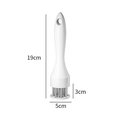 White needle meat tenderizer with dimensions 19cm height and 5cm base diameter - 16 Needles White Box