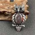 Retro owl pendant brooch with oval reddish-brown natural crystal and silver wings - Rainbow Stone