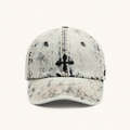 Acid wash denim baseball cap with black cross embroidery in blue and white texture - Cream