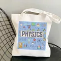 White canvas tote bag featuring blue physics formulas and science diagrams on a chair - C9 Physics Theme No Inner Pocket No Zipper