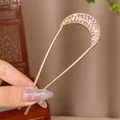 U-shaped golden hair pin featuring a crescent moon design with paved rhinestones - Glittering Diamond Crescent Golden