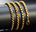 Detalle macro de una cadena veneciana dorada con cierre de mosquetón de alta calidad - Cadena veneciana dorada de 3.0 * 60 CM