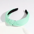 Chic mint green knotted wide headband featuring pleated knit fabric for casual summer styling - Mint Green