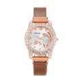 Detailed close-up of rose gold mesh strap watch with sparkling crystal bezel and dolphin dial - Rose Gold