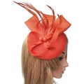 Elegant orange fascinator hat with decorative feathers and ribbon for parties - Orange