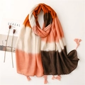 Chic autumn gradient scarf with tassels and colorful stripes on a white background - Orange