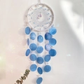Blue shell dream catcher with white woven ring and crystal accents for wall decor - Blue