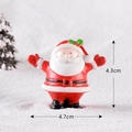 Miniature resin Santa Claus figurine with red outfit measuring 4.3cm by 4.7cm height - Santa Claus Style 2