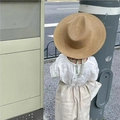 Kids natural brown woven straw sun hat with minimalist beige summer beach outfit - Camel