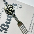 Polished stainless steel dinner fork with a black and white shell pattern handle inlay - Black King Kong Shell Fork