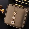 Rose gold titanium steel necklace with three clover pendants on bronze jewelry box - Clover Artificial Pearl Style (8886) / Rose Gold