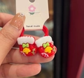 Christmas stocking hair ties in red resin with a bell detail for girls on a card - Red Rope Christmas Sock