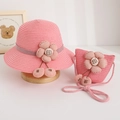 Detail of pink straw hat and matching bag set with 3D fabric flowers and checkered pendants - Hat + Bag Set / Watermelon red