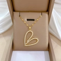 Collier cœur luxueux en acier titane doré avec zircons dans un écrin en velours - Pendentif En Cuivre Et Chaîne En Acier Titane E231