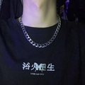 Men's silver titanium steel cuban link necklace shown on model with street style lighting - Curb Chain / 9mm Width 50cm Length