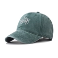 Close-up of white turtle embroidery on dark green washed cotton baseball cap - Adjustable / Dark Green Turtle