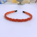 Orange beaded twist headband with braided pearl accents and black end fabric cover - Red